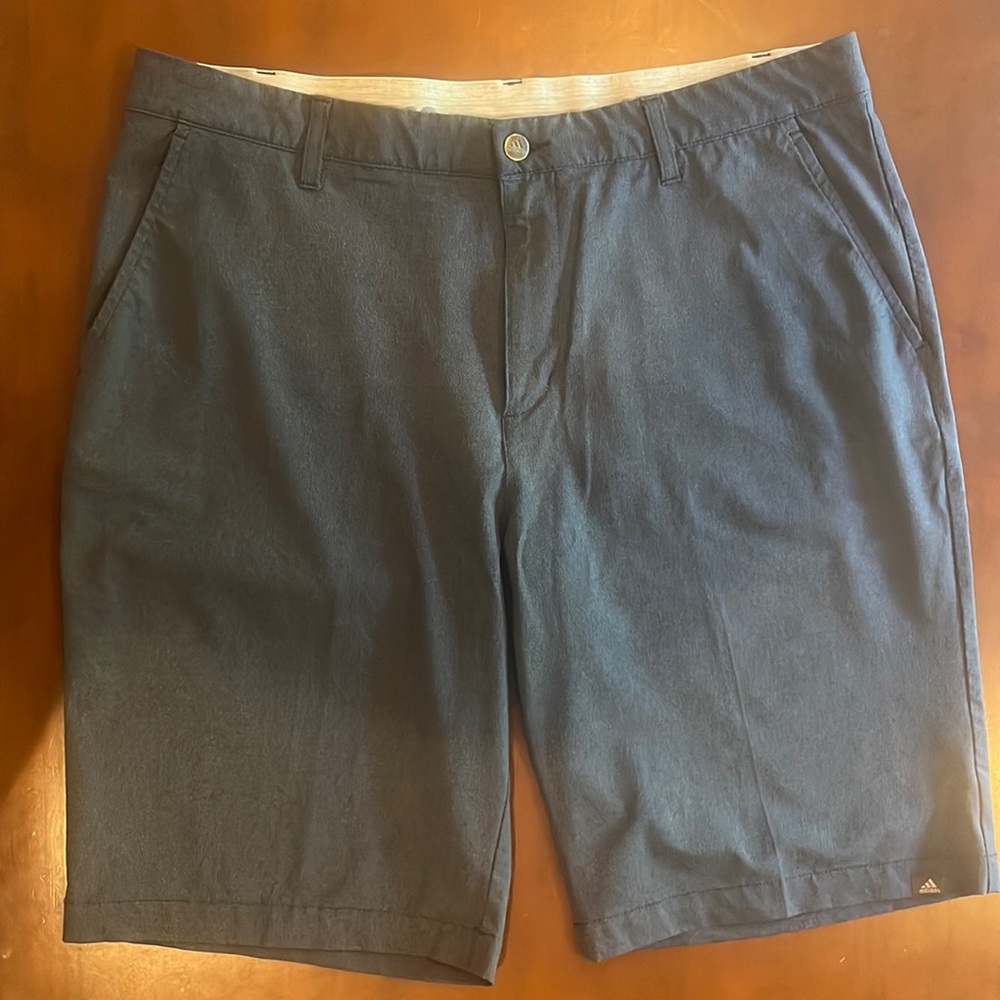 Adidas, 36, Navy golf shorts.